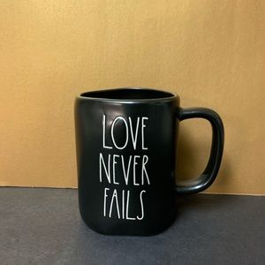 Rae Dunn brand new black LOVE NEVER FAILS mug